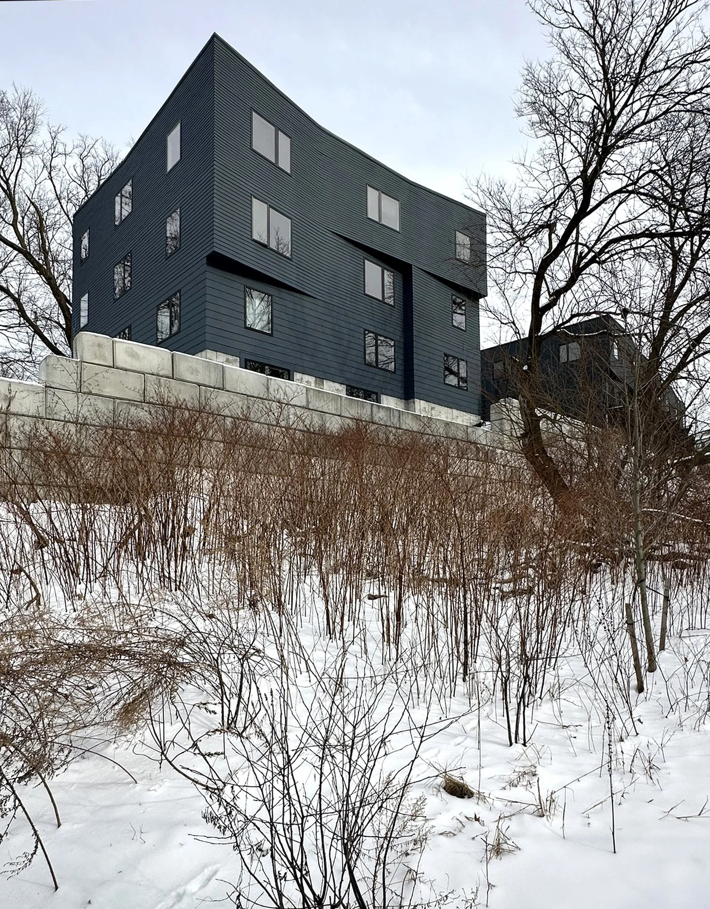 Matilda Overlook apartment building viewed from below on the hillside, showing the stepped design